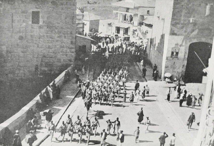 Ottoman soldiers marching through the Streets of at the beginning of WWI, Pales...
